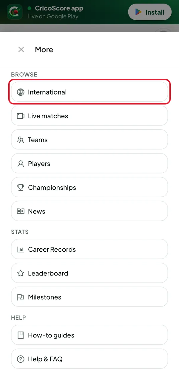 A phone with the More sheet open from the bottom bar, showing the Browse and Stats lists. International, the first item under Browse, is circled.