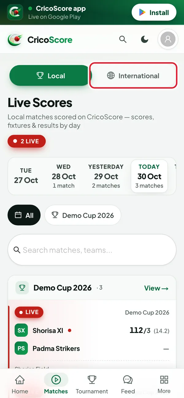 The Local and International switch at the top of the Live Scores page on a phone, with Local chosen. International is circled.