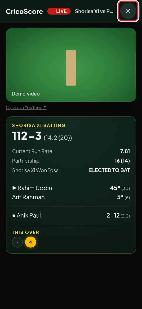 The live view on a phone, with the video at the top and the live score below. The ✕ button at the top right is circled.